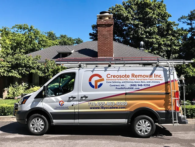 Tega Cay Chimney Sweep technician removing creosote safely in Tega Cay, SC