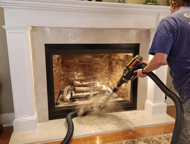 Fireplace cleaning performed by Tega Cay Chimney Sweep in Tega Cay, SC