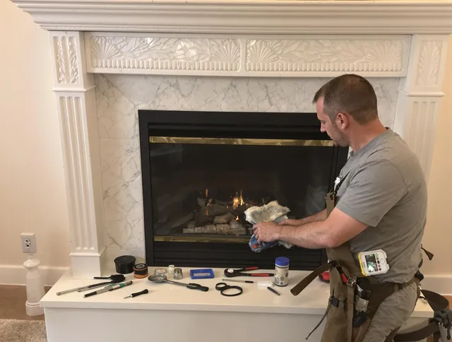 Tega Cay Chimney Sweep performing fireplace maintenance in Tega Cay, SC